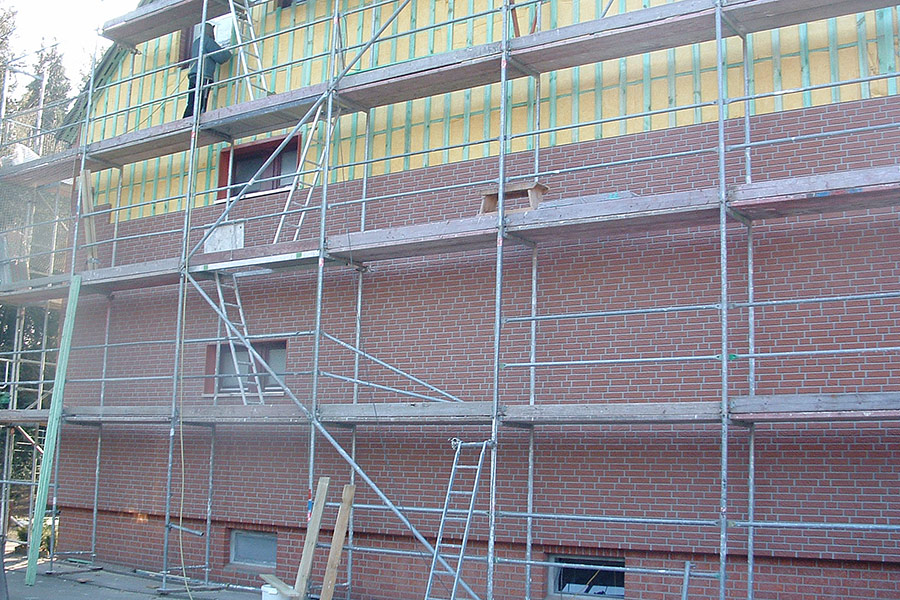 Verarbeitung unserer Fassadenplatten, Giebelsanierung mit Klinkerstruktur 